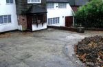 BEFORE: Old concrete driveway broken and crumbling