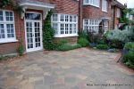 Driveway constructed using Crazy paving with red brick edging