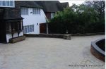 AFTER: New driveway installed using Marshall's Tegula paving with contrasting charcoal border