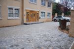 Driveway was constructed with tumbled paver's in graphite grey, brick wall and pillars built using matching brick to property