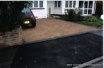 Driveway installed with Marshalls Driveline 50 in a mix of colours with Charcoal soldier course