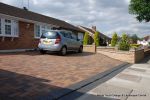 Driveway installed with Marshalls Driveline 50 in a mix of colours with Charcoal soldier course