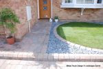 Driveway installed with Tegula paving with added jumper block, kerbs installed to retain split levels and feature circle lawn and fencing installed.