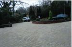 New driveway installed using Marshall's Tegula paving with contrasting charcoal border