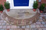 Half moon step built using Tegula kerbs & Sandstone paving
