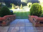 Garden needed a new landscape to match the character of the property a Sweeping ramp was installed with timber curved arbour, tumbled sandstone paving & circle installed and in cased with old stock brickwork capped with double bullnose steps built  with m