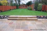 New lawn installed in 3 rings all edged with Tegula setts in pennant grey, new planting installed with maintenance plan