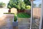 Lawn edged with raised decorative kerbs