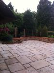 Tumbled sandstone installed to match character property