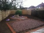 Garden was very overgrown this was cleared and new curve top fence panels installed garden was landscaped with Staffordshire pink gravel with red brick edge ready for planting in the spring 