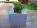 Block wall planter rendered to a fine finish and painted in gun ship grey